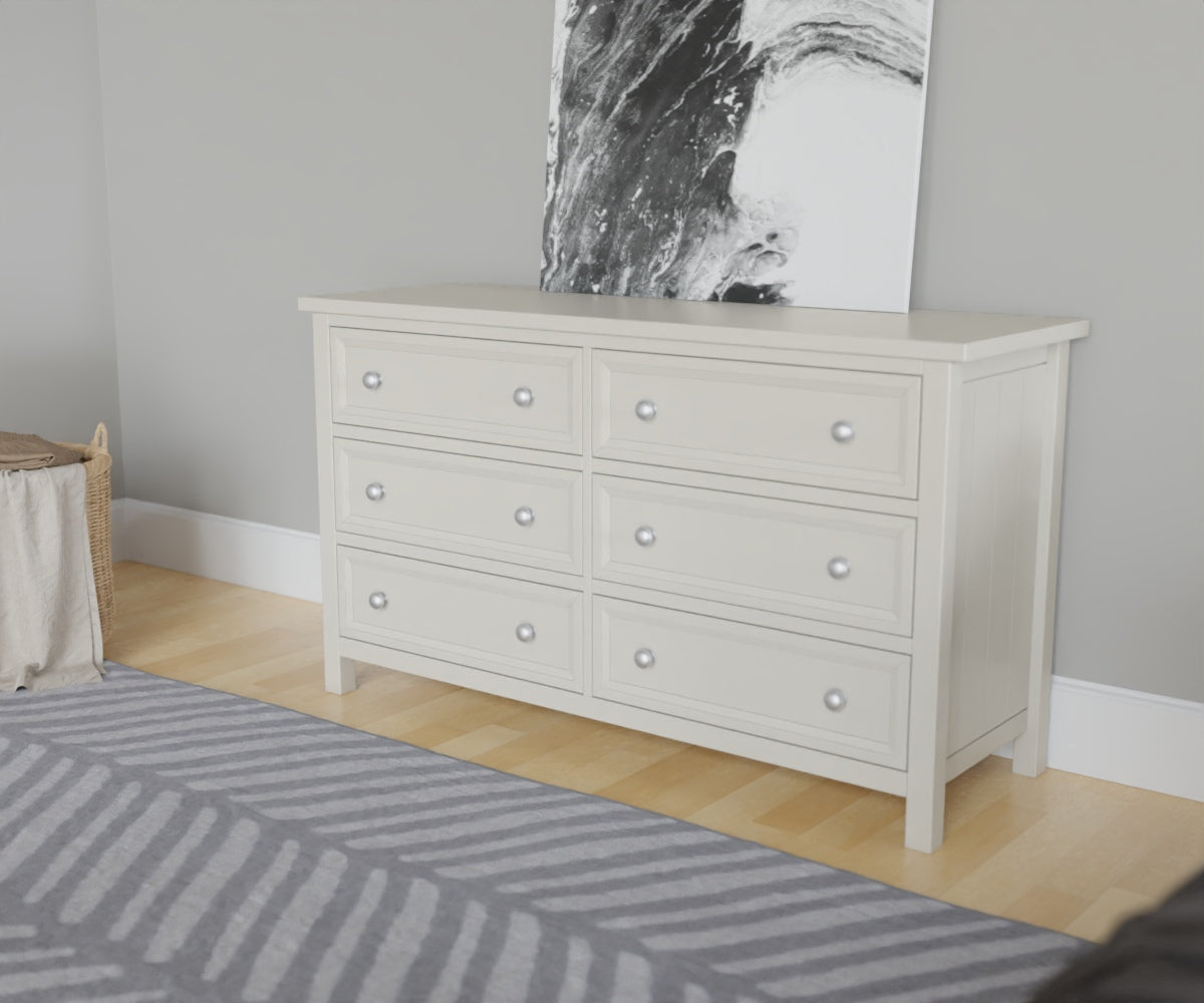Maine 6 Drawer Chest in white has a square-edged top, with 6 equal drawers in two columns. This lifestyle image features other products from the Julian Bowen Maine range.