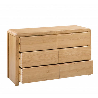 Julian Bowen Curve 6 Drawer Chest. Angled front view cut-out image on a white background, with drawers open.