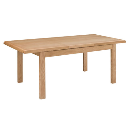 Julian Bowen Curve Oak Dining Table. Angled front view cut-out image on a white background, with extending leaf applied.